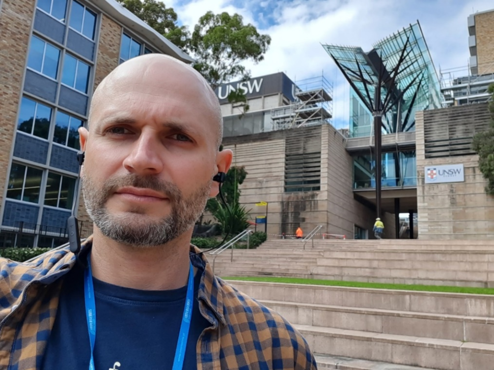 Dr inż. Daniel Jodko in Sydney, in front of UNSW.