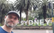 A photo in front of Sydney's City Name Sign
